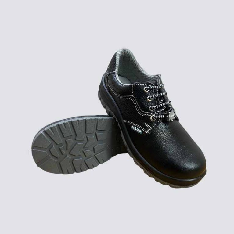 ROCK DD PU Safety Shoes with steel toe cap, chemical resistance, skid-resistant PU sole, buff leather construction, and spacer mesh lining for comfort.